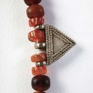Dzi focal fine double sided bead with traditional Hindu symbols, carved carnelian spacers, old silver rounds, mixed rosewood and carved wooden beads with small old tribal prayer amulets, sterling clasp - Image 3