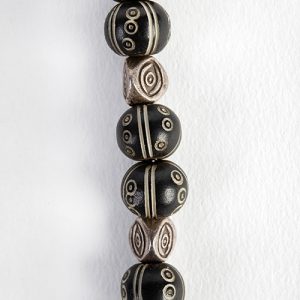 Japanese antique Obi incised bone ornament focal. with old Inlaid prayer beads, sterling Thai sterling 'eye' spacers, double sterling hooks framing rare Naga carved conch bead - Image 2