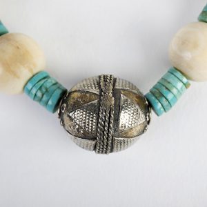 Moroccan gilded focal, turquoise heishi beads, conch, coral and bone beads, paired old silver spacers, sterling hook closure - Image 2
