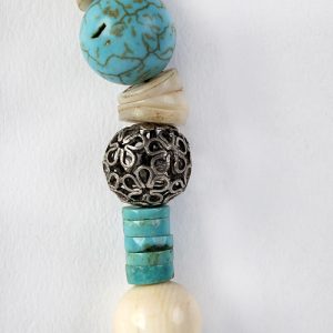 Moroccan gilded focal, turquoise heishi beads, conch, coral and bone beads, paired old silver spacers, sterling hook closure - Image 3