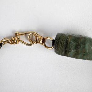 Black coral inlaid focal, green turquoise roundelles, large green agate, gilded bead spacers and hook closure - Image 4