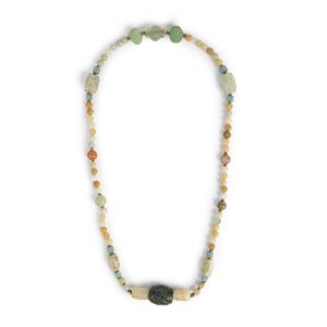 Jade large carved focal. mixed incised and carved  or incised jade beads, tiny brass spacers.  Old glass beads ending statement - Image 1