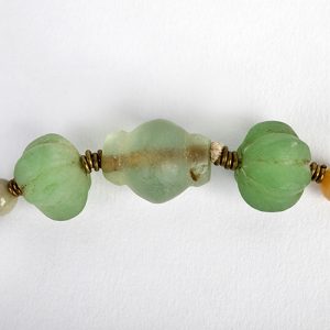 Jade large carved focal. mixed incised and carved  or incised jade beads, tiny brass spacers.  Old glass beads ending statement - Image 4